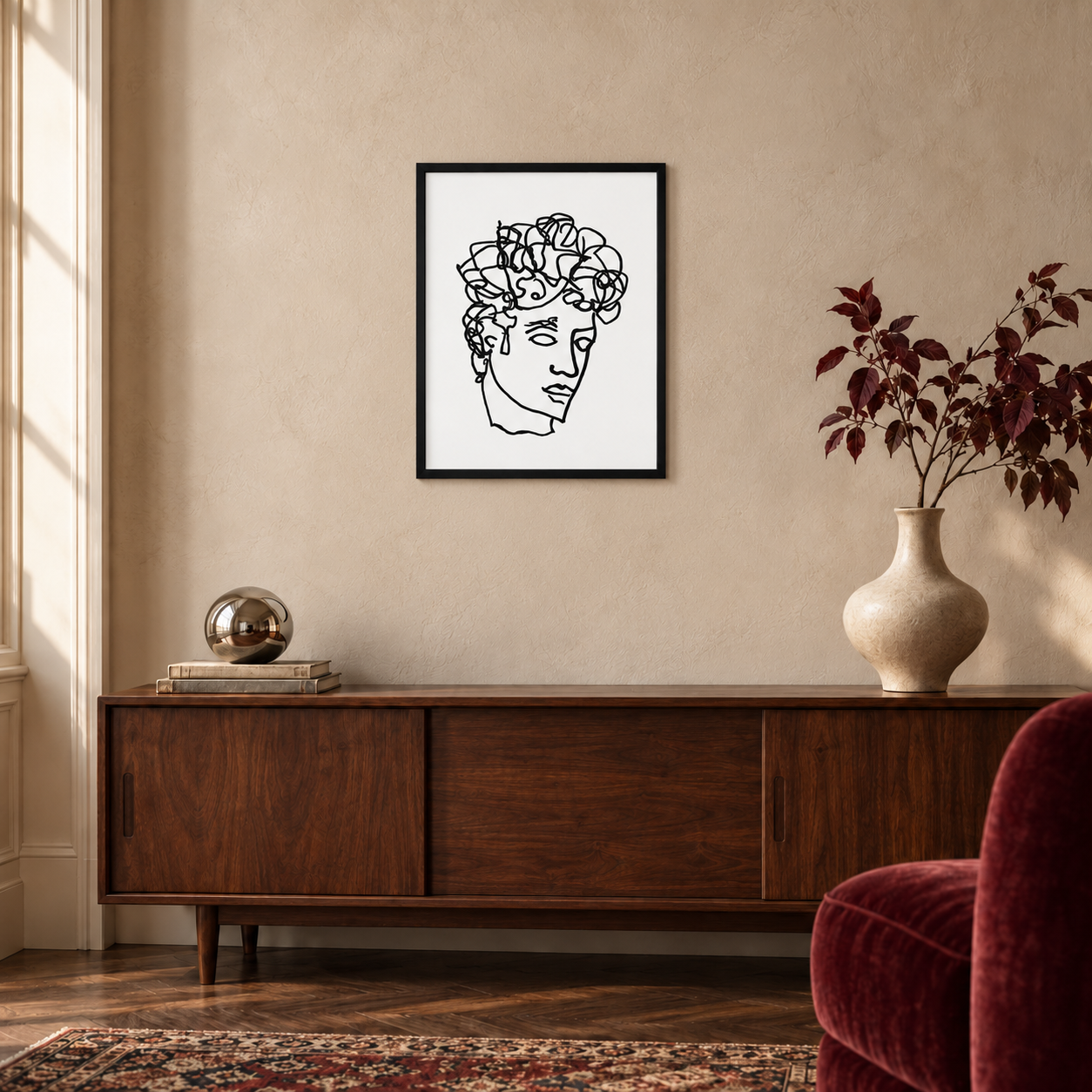 Quirk Antinous ballpoint line drawing in a black 16 × 20 inch portrait frame above a walnut console, shown for styling inspiration