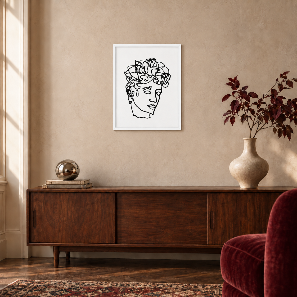 Quirk Antinous ballpoint line drawing in a white 16 × 20 inch portrait frame above a walnut console, shown for styling inspiration