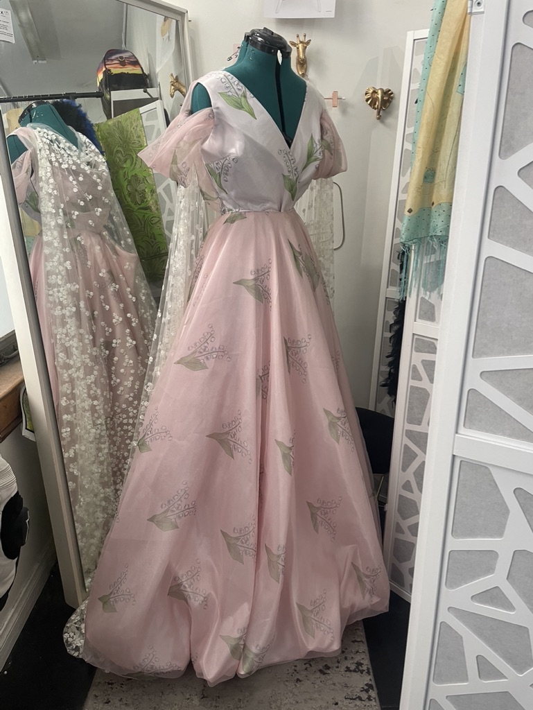 The full coordinating wedding dress on the form.