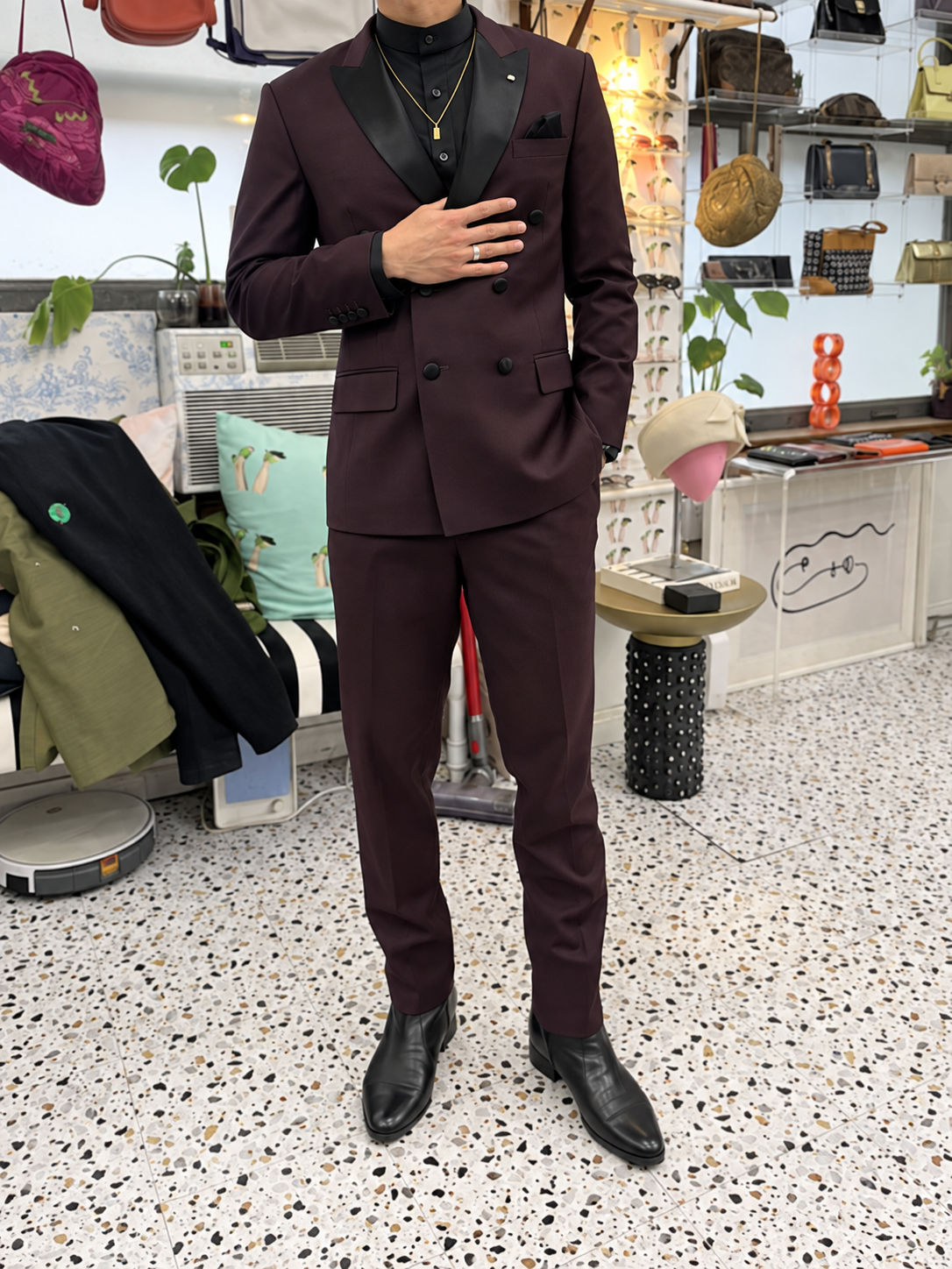 Front fitting view — the complete burgundy tuxedo.