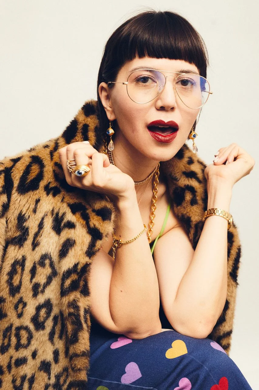 Melynda Choothesa, founder of Quirk and Couture Zen, in a leopard-print coat and colorful trousers