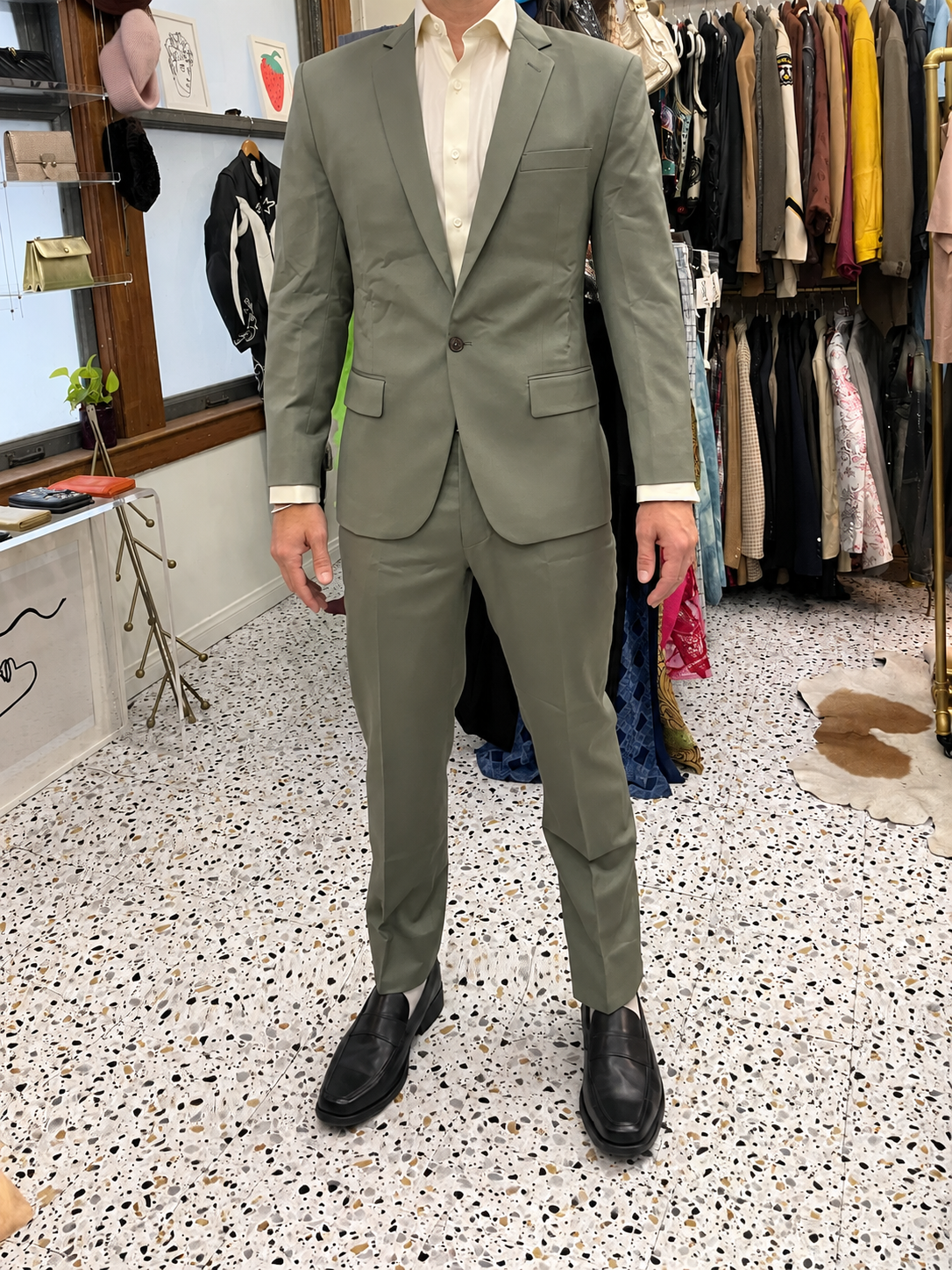 Front fitting view — jacket, trousers and footwear.