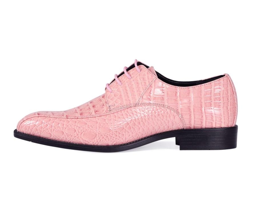Side profile of the Amali Harvey pink Oxford shoe, showing the glossy patterned upper, curved stitched panels, dark sole and low block heel.