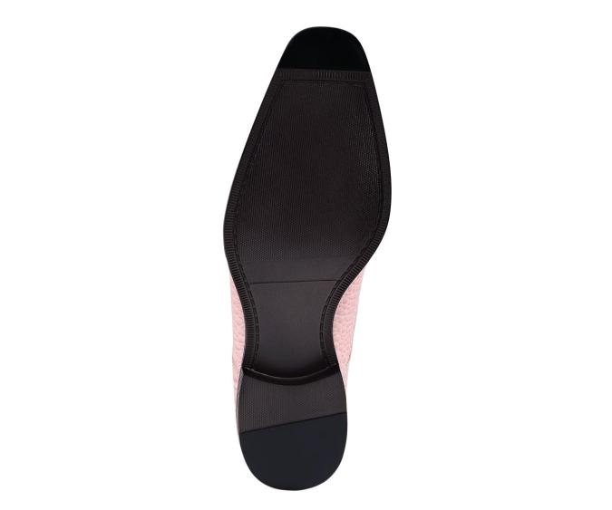 Sole view of the Amali Harvey pink Oxford shoe showing the dark outsole, textured forefoot and heel.