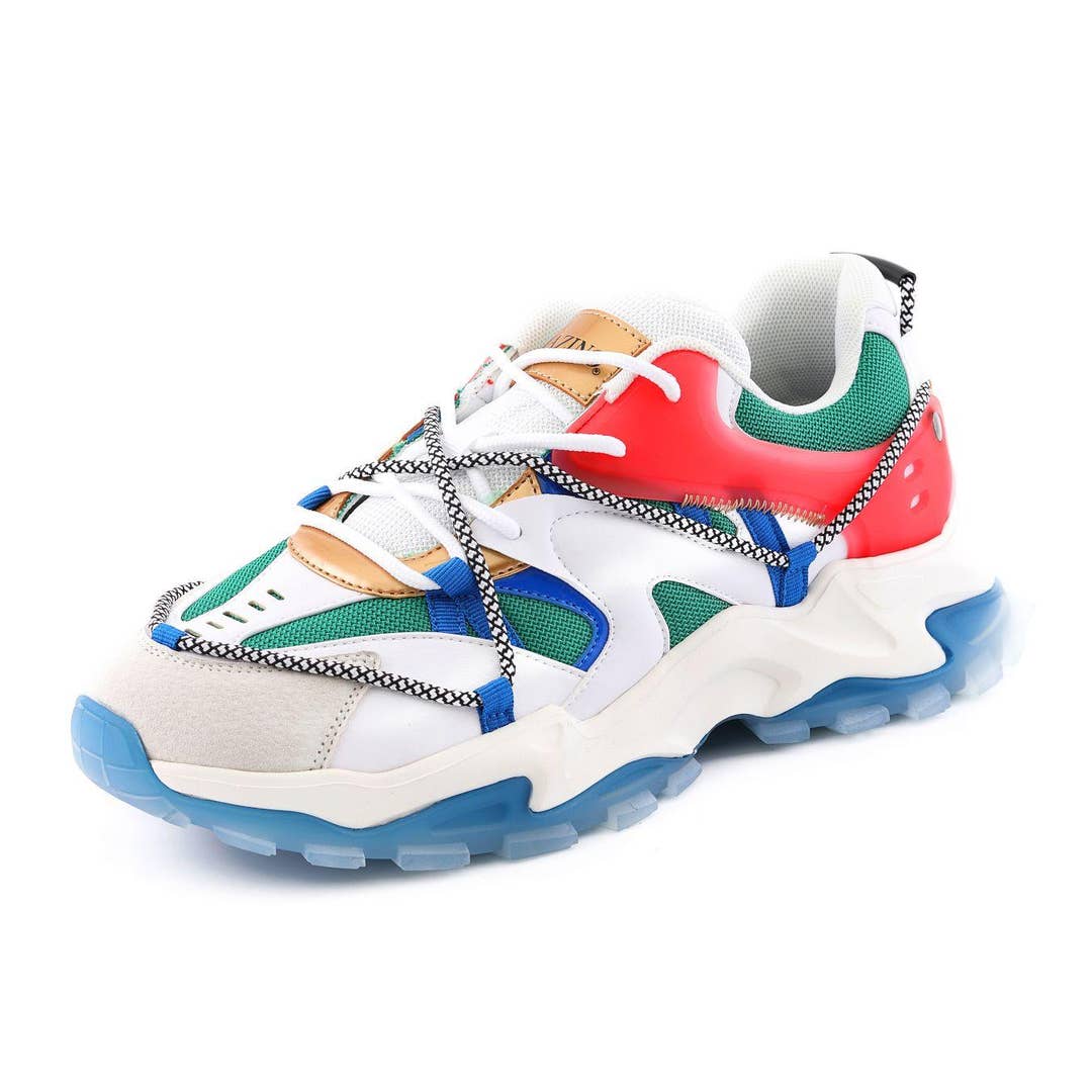 Angled view of a Mazino Strata sneaker with white overlays, red and green panels, blue sole accents, tan details and crossing black-and-white cord