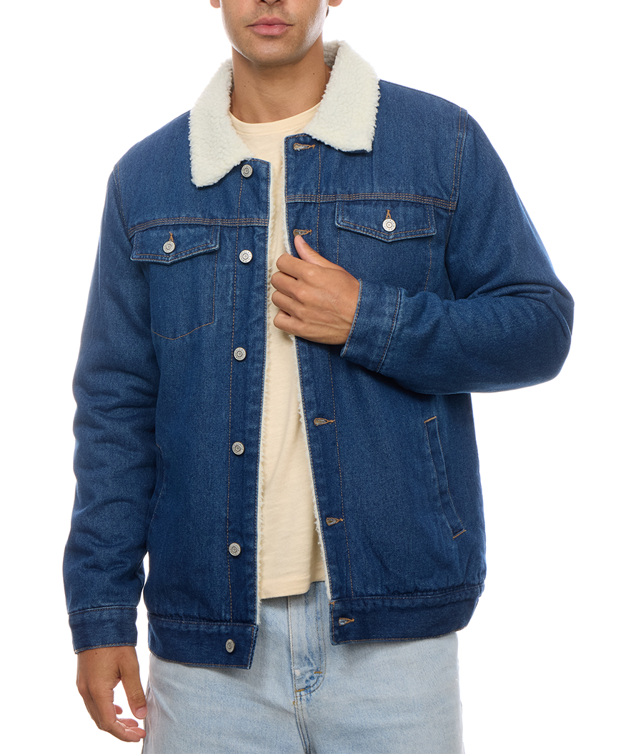 Nose-down front view of the PX sherpa-lined denim trucker jacket, with a hand at the front opening and the full collar, sleeves and hem visible.