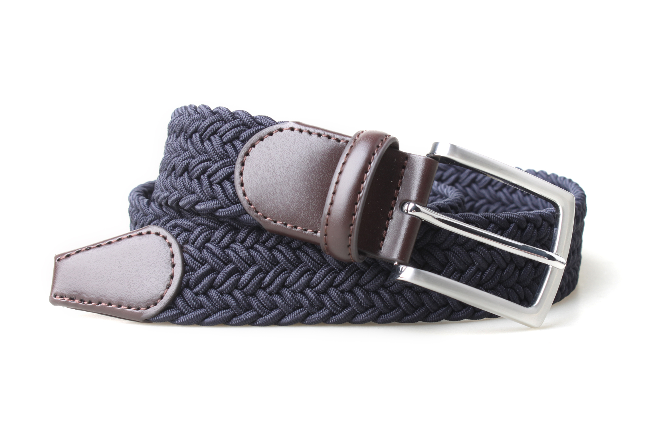 PX navy braided stretch belt coiled on white, with brown leather ends, matching stitching and a satin nickel-finish rectangular buckle.
