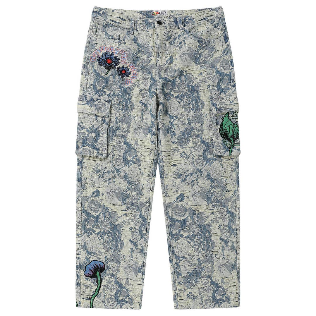 Front view of VERYRARE Dark Lotus cargo pants with pale blue and cream floral jacquard, dark lotus embroidery, green bud details and side flap pockets