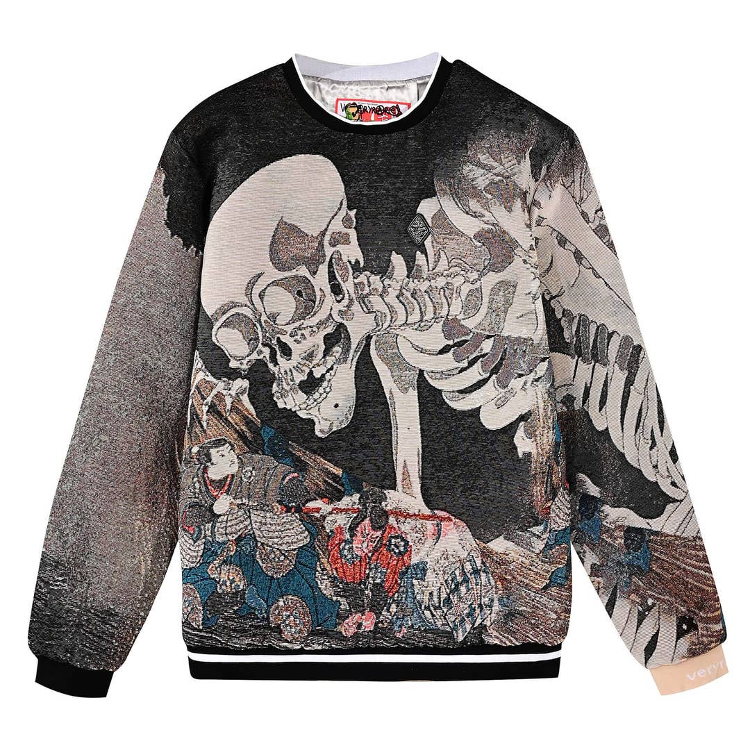 Front view of the VERYRARE Gashadokuro cotton-polyester tapestry-jacquard crewneck, with a large cream skeleton and blue, red and brown details against black and gray