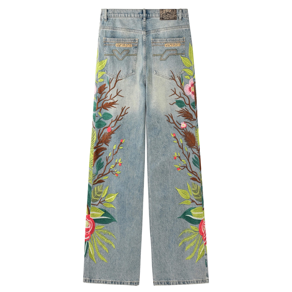 Full back of VERYRARE Sakura denim pants with embroidered branches, branded rear pockets and a patterned waistband patch.