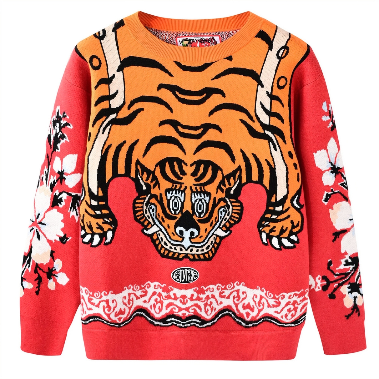 Front view of the VERYRARE Tiger Rug crewneck with an orange and black tiger, coral-red ground, floral sleeves and ribbed edges