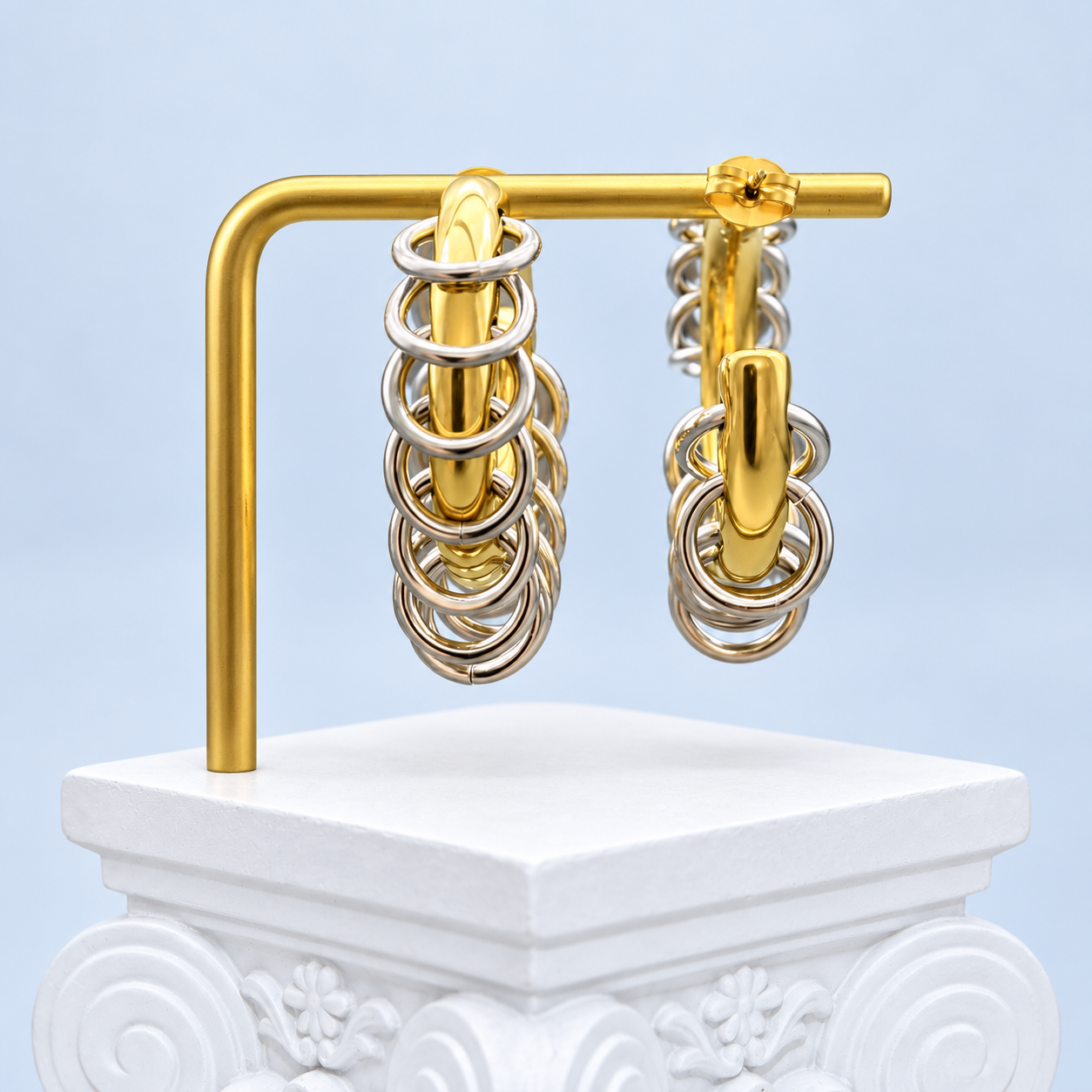 Front and reverse views of Mio Queena ring fringe earrings, showing the gold-plated backs, straight posts and butterfly fastenings.